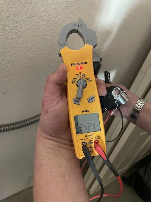 Voltage testing with clamp meter during Whole House Surge Protector in Plainfield